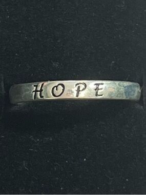 Sterling silver “Hope” ring. 925
Size 9.75